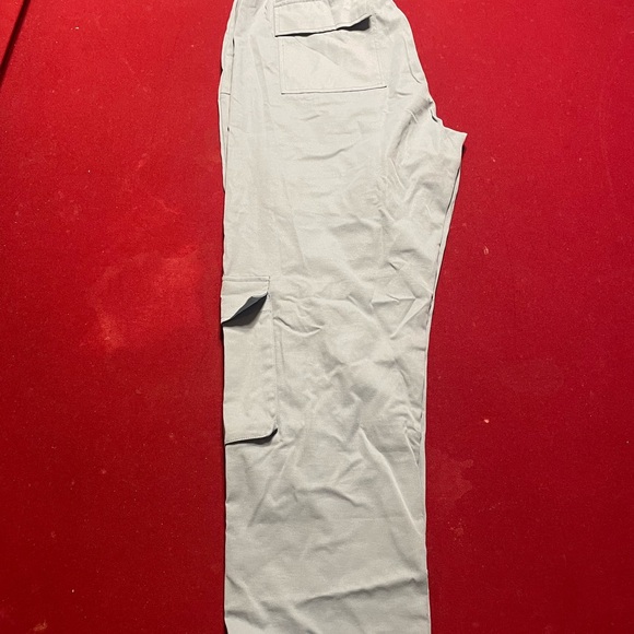 Brand new cargo pants with adjustable ankle straps. - Picture 3 of 4